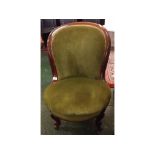 Victorian mahogany balloon back and green upholstered nursing chair