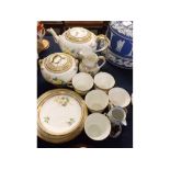 19th century English part tea set, with painted rose decorated panel with gilded border,
