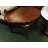 Oval extending dining table, fitted with a single leaf and raised on four cabriole legs with pad