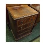 Reproduction mahogany narrow chest of drawers, fitted with four full width drawers with inlaid