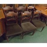 Set of six William IV mahogany dining chairs with shaped and carved bar back on tapering cylindrical