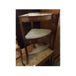 19th century mahogany corner washstand, of typical form, fitted with a single drawer, shaped