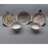 Pair of large 19th century famille rose decorated tea cups and saucers with multi-coloured