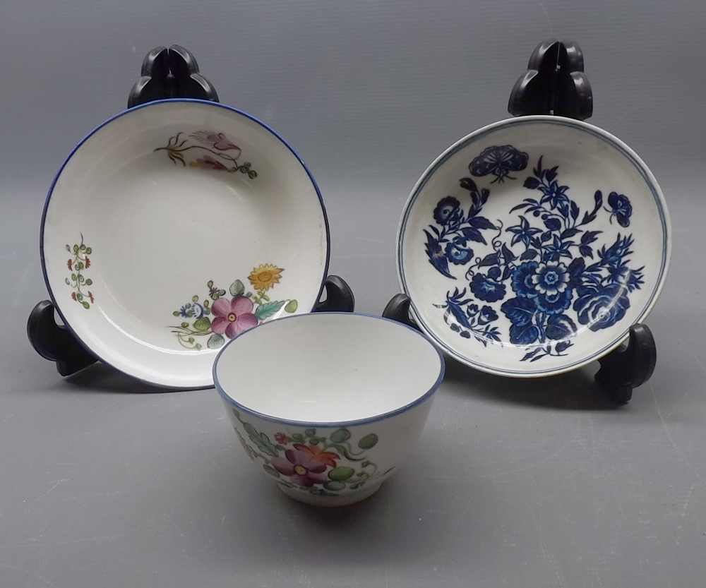 19th century New Hall cup and saucer with floral decoration, together with a further 19th century