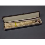 Vintage bone or composition fan (boxed), 7 1/2" long
