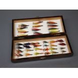 Vintage oak cased set of fishing lures/flies, the box with lid carved with a motif of a fish, 9"