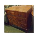 Early 20th century walnut chest of three drawers, with quarter veneered top and brass handles, on