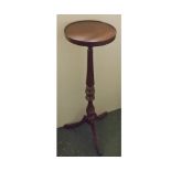 Mid-20th century mahogany plant stand, with circular top with reeded and knobbed column on a splayed