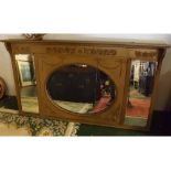 Late 19th century gold painted triple overmantel mirror, with overhanging pediment and set with