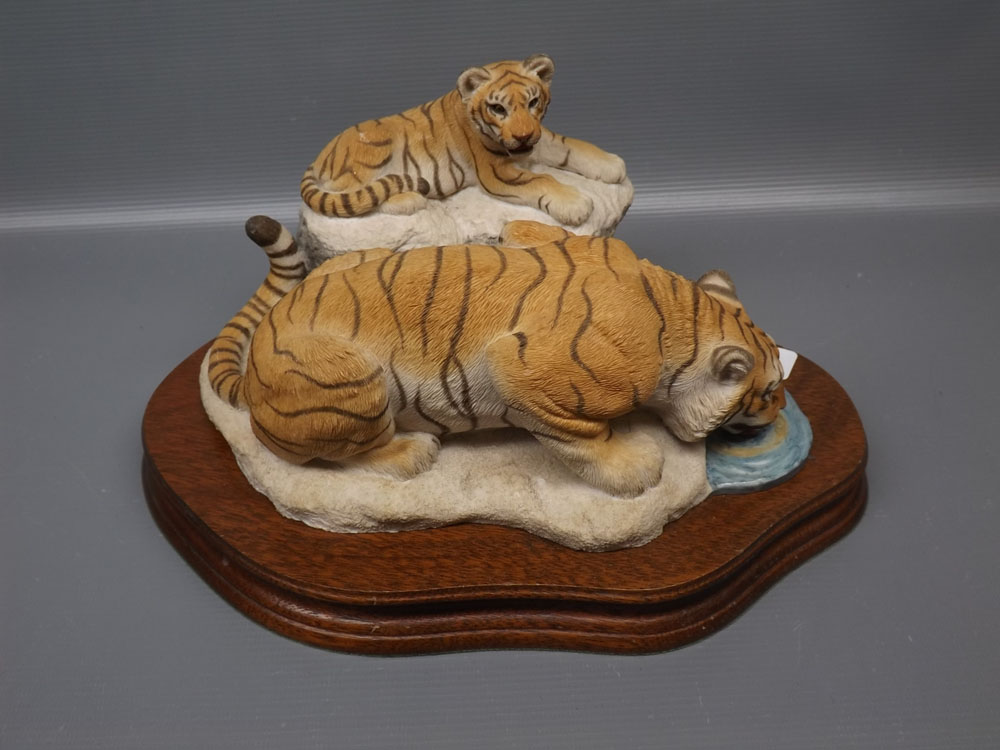 Unboxed with certificate Wild Tracks, model as a tiger and tiger cub on a teak plinth