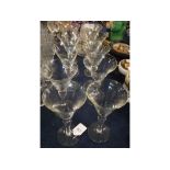 Set of 10 modern clear glass wine glasses with knopped stem and fluted bowls, 7" tall