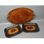 Two small Toll ware trays decorated with silhouettes of children and a further inlaid oval two-