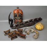 Group : African mask, set of six carved wooden napkin rings, carved wooden elephant bridge, beaded