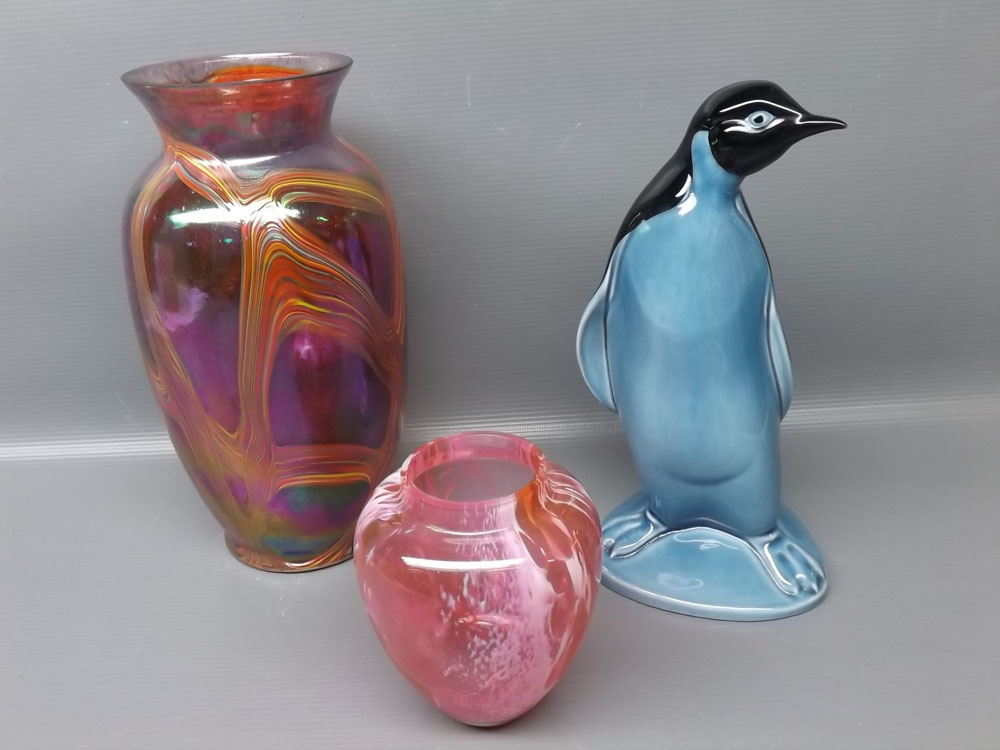 Poole Pottery model of a standing penguin with underglazed blue detailing, together with a further