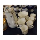 Shelley Chelsea part coffee set, with floral decoration, comprising four coffee cans and saucers,