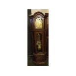 A late 20th Century Stained Oak and Glazed Floorstanding Clock, the one-piece case with