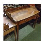 Edwardian mahogany bow fronted single drawer side table, with galleried edge and inlaid stringing