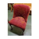 20th century red upholstered nursing chair with cabriole front legs