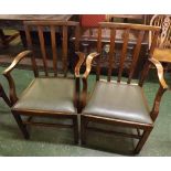 Pair of early 20th century oak framed carver chairs with green drop in seats