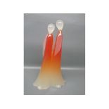 Modern coloured Studio glass model of two entwined figures with opaque heads and red decoration to