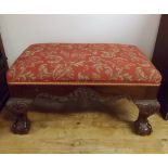 Reproduction Irish style mahogany rectangular footstool, with red and foliage upholstered top with