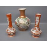 Pair of 19th century Kutani decorated bulbous vases, red ground with floral panels, together with