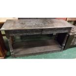 Victorian Gothic sideboard, fitted with two heavily carved drawers, with open shelves supported on