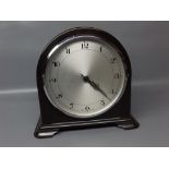 Bakelite cased mantel clock, 8" high (lacking glass)