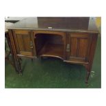 Edwardian walnut sideboard, fitted with open shelf, two panelled reeded doors either side, ringlet