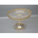 19th century clear glass tazza with gilded Grecian key detail to top and circular foot, top