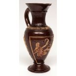 Castle Hedingham large ewer, typically moulded and decorated in the majolica style with mythological