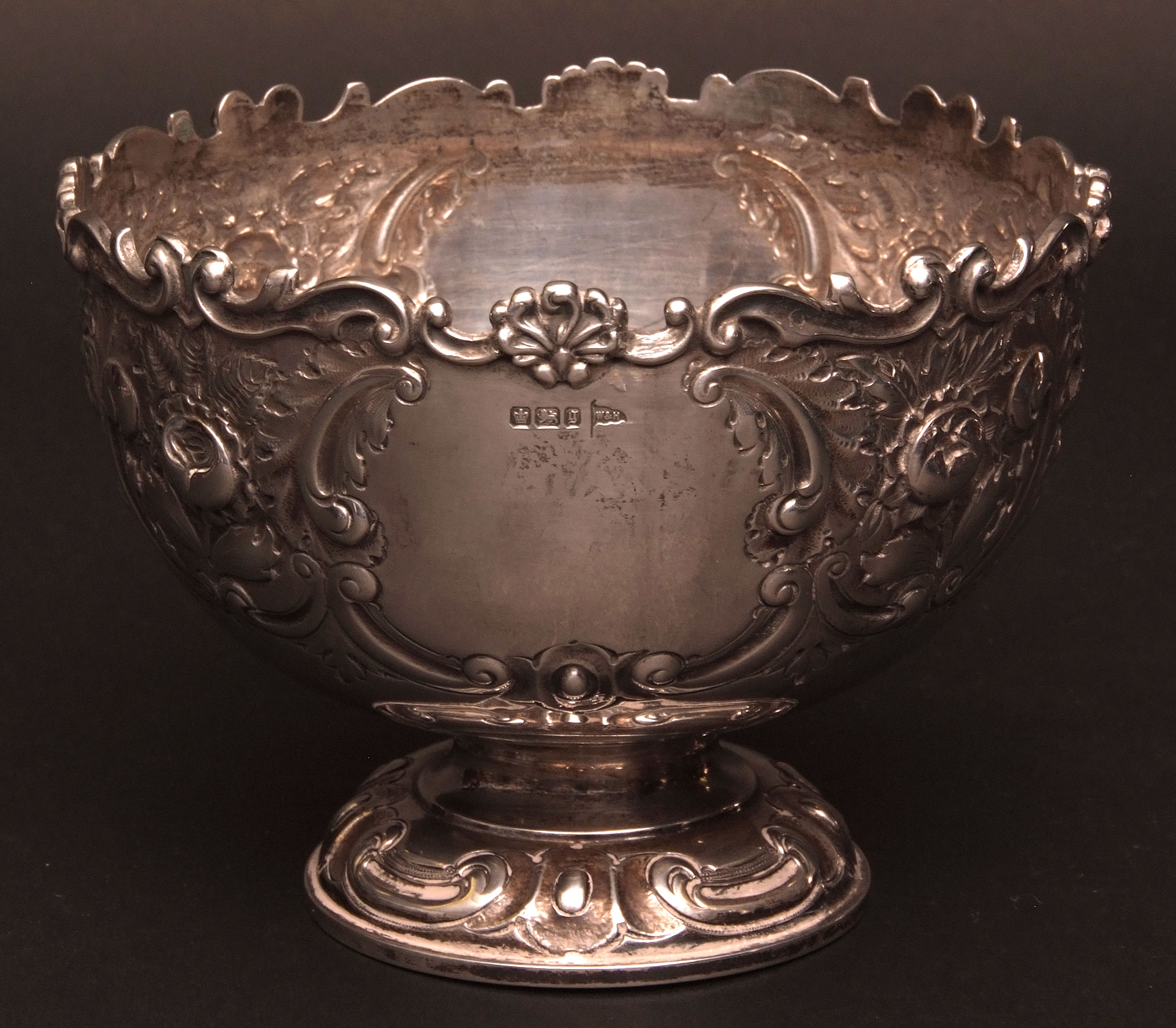 Late Victorian rose bowl of circular form with cast and applied C-scroll and shell border to a