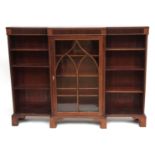 19th century mahogany break front bookcase/display cabinet, central astragal glazed door enclosing