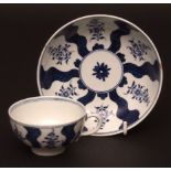 A Lowestoft tea cup & saucer c1770 decorated with the Robert Browne pattern of floral sprays