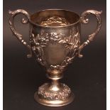 Victorian two-handled trophy cup, of goblet form with leaf capped cast and applied handles to a body