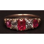 Victorian ruby and diamond five stone ring, the three graduated oval cut rubies having two brilliant