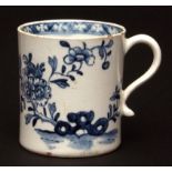 An attractive Lowestoft coffee can or small mug, c1765, well painted with a flowering plant and