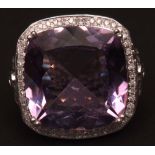 Modern previous metal amethyst and diamond ring, the large square cushion cut purple amethyst (20