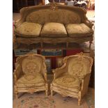 Decorative Louis Quinze style suite, ornately crested with painted floral mounts, slightly splayed