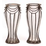 Pair of unusual glass baluster vases of waisted circular form, overlaid with anodised base metal