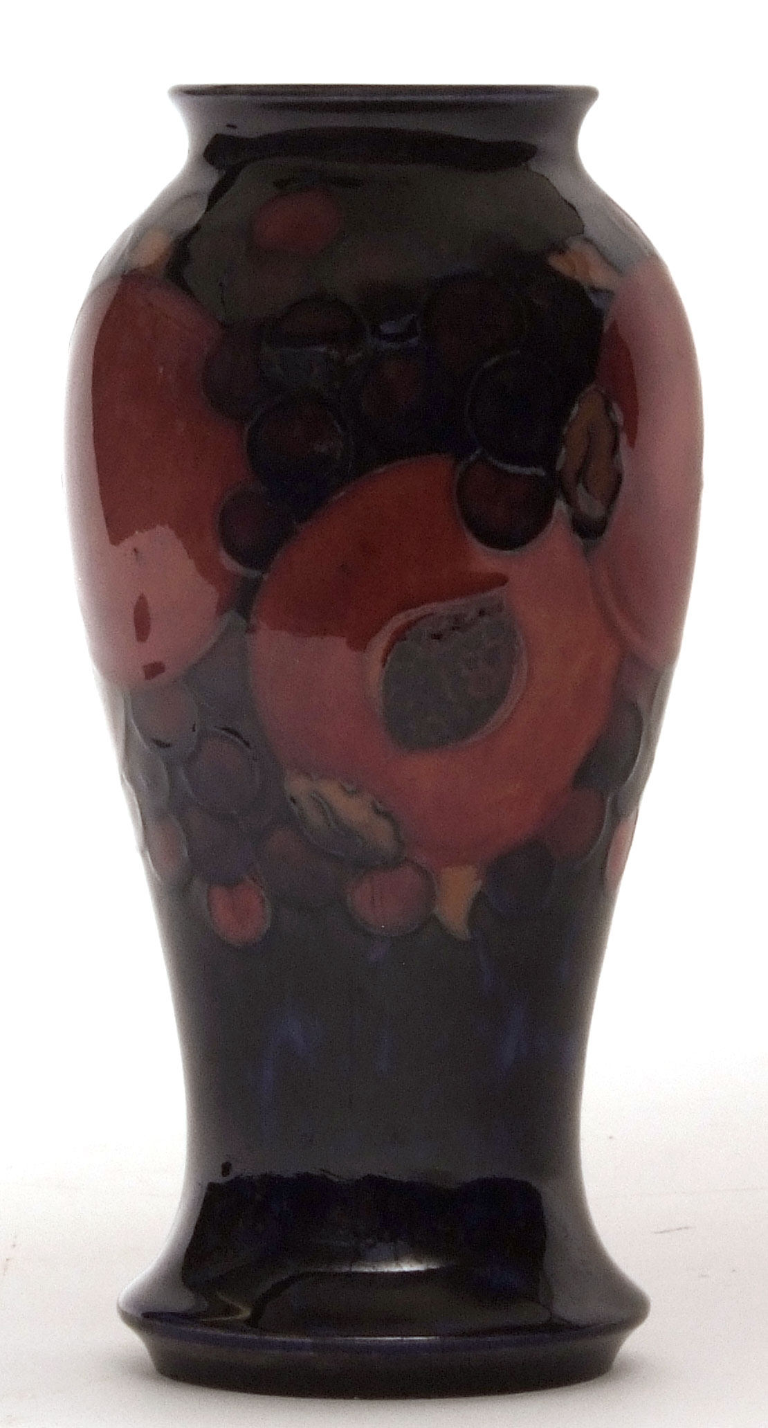 Moorcroft "Pomegranate" pattern baluster vase of tulip baluster form, typically decorated on a