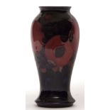 Moorcroft "Pomegranate" pattern baluster vase of tulip baluster form, typically decorated on a