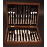 Cased set of 12 each Kings pattern dessert knives and forks, each with later blades and tines and