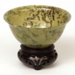 Chinese spinach jade bowl with everted rim, 4 ins wide, hardwood stand