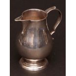 George II "sparrow beak" cream jug, of typical plain polished baluster form with cast and applied