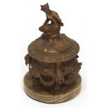 19th century gilt bronze container of baluster circular form, the lift off cover crested with a