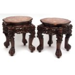 Pair of 19th century Chinese hardwood jardini re stands with deeply carved and pierced decoration of