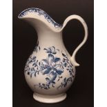 A Worcester jug c1775 painted with the Mansfield pattern of floral spray and trailing flowers with