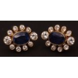 Mid-20th century pair of sapphire and diamond cluster earrings, the oval facetted sapphires (7 x 5mm