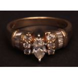 Late 20th century yellow metal and diamond cluster ring, the centre set with a marquise diamond (0.